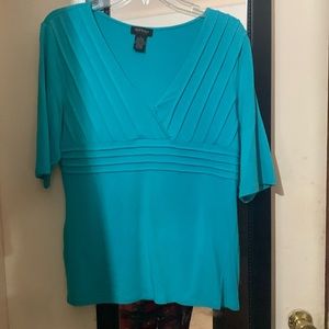 Cute ladies ribbed blue top. Hardly worn at all.